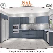 This relatively new material is increasing in popularity due to its contemporary look and durability. China N L Modern High Gloss Lacquer Kitchen Cabinet China Lacquer Kitchen Cabinet White Lacquer Wooden Cabinet