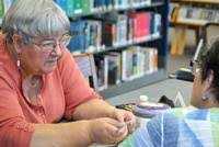 Crafters gather to learn knitting, crocheting