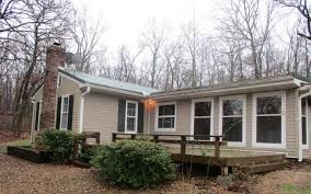 Home Is An Earth Berm Home With 3 Non Conforming Bedroom 1 5 Bathrooms Has A 2 Car Detached Garage As Well As A Sto Built In Storage Detached Garage Building