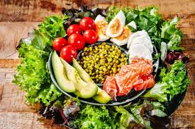 In a large bowl, combine the arugula, salmon, bagel chips, dill, tomatoes, onions, and capers and toss lightly. Super Food Healthy Food Diet Food Smoked Salmon Salad Poke Bowl With Avocado Eggs Cucumber And Greens And Radishes Stock Photo Picture And Royalty Free Image Image 164038355