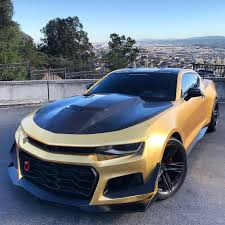 chevrolet camaro zl1 1le painted in summit white and wrapped in satin chrome gold photo taken by moezl1le on instagram owned b camaro car camaro chevy camaro chevrolet camaro zl1 1le painted in