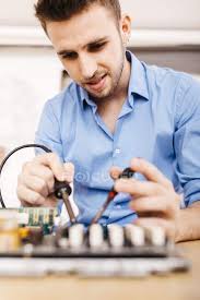 There are 2 different sets of questions for this title. Technician Repairing A Desktop Computer Soldering A Component With Tin Spain Caucasian Stock Photo 463949702