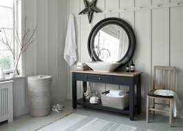 Top drawer pushes in and bottom doors open to reveal the unsightly laundry basket. Ashcroft Rattan Style Laundry Basket Neptune
