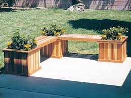This inviting space features a decorative concrete patio with a custom concrete fire pit and ipe floating bench. Built In Patio Planter Ideas Grow Your Outdoor Space