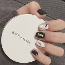 Cute Black And White Marble Nails Nail And Manicure Trends However, not everyone wants to rock super long talons.
