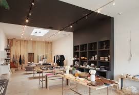 storey garde paneled wall design milk retail interior design shop interior design retail interior