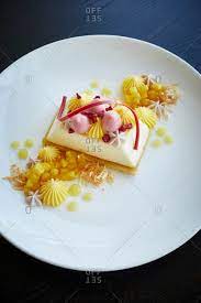 Keep dessert simple and enjoy strawberries in their unadorned glory with a hint of balsamic vinegar and a touch of honey. Fine Dining Cheesecake Dessert Offset Stock Photo Offset
