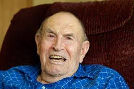 My Uncle Warren Van Hook tending to the herd of Buffalo.. He lived close to  Jackson Heights in southwest Tippecanoe county. At one time had the largest  domesticated herd east of the