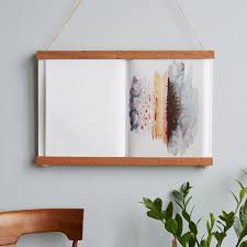 Display Coffee Table Books Beautiful Pages With Jamie Esslinger Michael Smith S Rustic Hanging Holder Chan Book Holders Coffee Table Books Hanging Wall Art