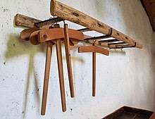 Something that hangs, overhangs, or is suspended: Clothes Hanger Wikipedia