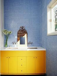 These bathrooms utilized yellow tubs, other yellow floor tiles and other yellow accessories. 43 Bright And Colorful Bathroom Design Ideas Digsdigs Trendy Bathroom Tiles Yellow Bathrooms Bathroom Interior Design