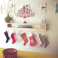 To hang ornaments or stockings on different levels, you can hang them with brown twine like i used on my mantel for a little more rustic look, or you if you are hanging the ornaments from a mantel or window, just stick a command hook in a discrete spot and then you can hang the ornaments with. Out With The Old Right Hanging Christmas Stockings Christmas Deco Christmas Themes