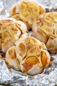 Sprinkle garlic and rosemary over tenderloin. How To Roast Garlic Oven Stovetop Jessica Gavin