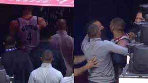 A fan dumps popcorn on russell westbrook while he walks off after an injury. Mvkohtqqyx Nqm
