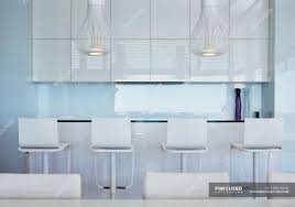 Add a touch of luxury to your home with our carefully curated collection of designer stools. Bar With Stools At Luxury Modern House Real Estate Decor Stock Photo 199375570