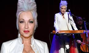 Cyndi lauper's detour is front and centre the result of a woman clearly enjoying her craft and comfortable enough to explore new genres. Cyndi Lauper 66 Debuts Cotton Candy Faux Hawk And White Pantsuit At Love Rocks Concert In Nyc Daily Mail Online