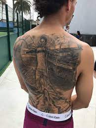 The german international spent four days having an image of him celebrating scoring a goal for manchester. Manchester City Winger Leroy Sane Has Opened Up About The Giant Tattoo He Has Had Inked On His Back Leroy Sane Soccer Player Tattoos Football Tattoo