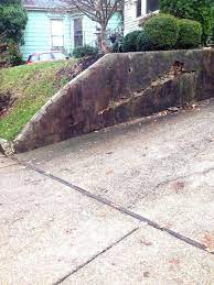 How To Inexpensively Repair A Crumbling Retaining Wall At Your Home Retaining Wall Repair Retaining Wall Landscaping Retaining Walls