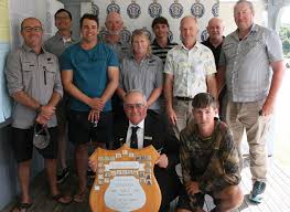 The South Island team sporting the winning trophy. Knocking the North  Island over again. Kaituna team members Malcolm, Clinton, Riley, Dylan,  Jonno, Jacob and team captain Helen.