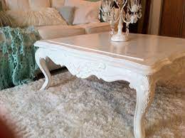 A blend of contemporary design with a touch of industrial chic, this coffee table offers a modern vibe with its linear steel frame and smooth finish. Shabby Chic Coffee Table This One Is Better Wooden Top Instead Of Glass Shabby Chic Decor Diy Shabby Chic Sofa Shabby Chic