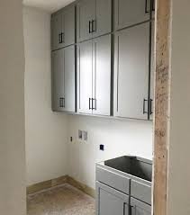 Oak may be combined with different types of glass, to increase its resistance to theft or uv damage. Grey Kitchen Black Handles