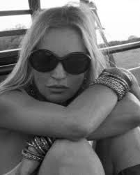 According to #KateMoss, Glastonbury 2003 was “a vintage year”. Papped  wearing a pale pink dress with moccasin boots and a silk scarf knotted  around her hips, her festival look pre-dated Instagram, and ...