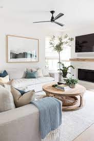 6 Coastal Fireplace Ideas That We Wouldn T Mind Snuggling Up To Hunker Living Room Colors House Interior Neutral Living Room