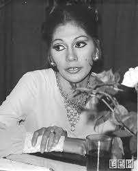 TWO FILIPINO LOCAL NATIVES POSED FOR A PHOTOGRAPH FROM LONG AGO WITH THEIR  MUSICAL INSTRUMENTS IN THEIR ARMS."