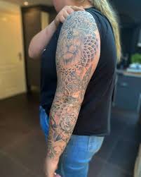 But a well done floral tattoo isn't necessarily all about the color: Top 49 Tattoo Sleeve Filler Ideas 2021 Inspiration Guide