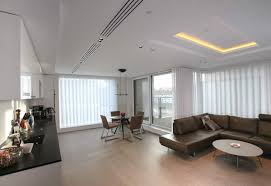 Curtains elevate the look of your room and add a touch of class and finesse to your tall windows. Curtains And Blinds W14 For A Contemporary London Apartment