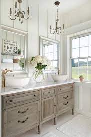 For a contemporary look, try using a round, hanging master bathroom mirror instead of a plain rectangular one. The Story Behind The Beautiful Chaos Farmhouse Small Bathroom Remodel Bathroom Decor Master Bath Vanity