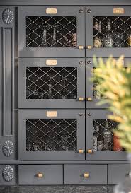 Dark Gray Cabinets With Brass Hardware And Wire Mesh Insert Remodel Bedroom Basement Design Master Bedroom Remodel