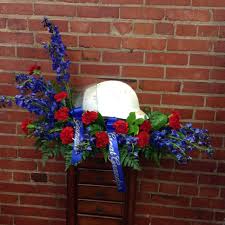 Wizard of oz funeral flowers. Man Had Been On A Volunteer Fire Dept For 47 Years His Helmet Was Brought In By The Family Fl Funeral Flower Arrangements Valentines Flowers Sympathy Flowers