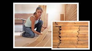 Glueless laminate flooring is easy to install and can be walked on the same day. Installing Laminate Wood Floors Youtube
