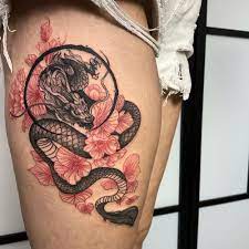 Since japanese dragon tattoos tend to be incredibly intricate and detailed, the back is the most in irezumi, the most common floral depiction is the lotus. Tattoo Tagged With Blackw Dragon Flower Pink Thigh Inked App Com