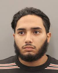 ARRESTED: Booking photo of Julian Giovanni Vazquez, 24, now charged with  murder in the fatal shooting of a man at 1175 Edgebrook Drive