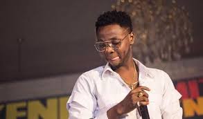 Kizz daniel surprise chidinma with a new bentley Kizz Daniel Gifts Twin Babies Houses Fails To Disclose Identity Of Their Mother The Whistler Nigeria
