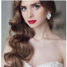 A braided bun makes a great vintage wedding hairstyle for women when coupled with long and straight bangs. Vintage Hairstyles Long Waves Curls Wedding Hairstyles Curls For Long Hair Vintage Hairstyles Wedding Hair Down