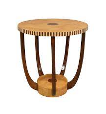 Art deco furniture also riffed off the worldly trend, incorporating exotic materials like dyed animal hides or tessellated bone. Art Deco Round Coffee Table Art Deco Furniture