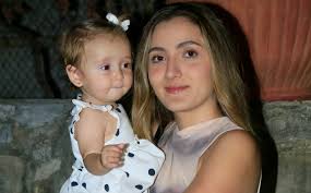 Adrián Reiter recibe sacramento del bautismo