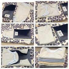 But tiny baby clothes are always difficult to fold, store and arrange neatly! Clever Way To Neatly Fold Onesies Pressed Before Folding Baby Clothes Organization Baby Clothes Storage Folding Baby Clothes