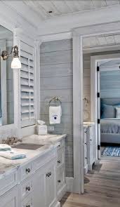 The blue, patterned paisley wallpaper resembles large drops of water. 62 Marvelous Lake House Decor Ideas Beach House Bathroom Coastal Bathroom Decor Beach Bathroom Decor