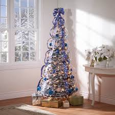 Ribbons fall from small bows and cascade around the tree effortlessly with this easy ribbon. 1001 Ideas On How To Decorate A Christmas Tree