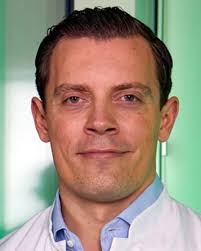 Dr. Julian Wichmann, M.D.