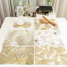 A placemat is a piece of fabric, vinyl or woven material that is placed under a place setting and is designed to protect the dining table underneath. Coffee Table Tablecloth Single Sided Printing Placemats Waterproof Gold Leaf Shaped Insulation Pad Household Placemat Mats Pads Aliexpress