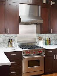 A Contemporary Small Kitchen Makeover Brown Kitchen Cabinets Contemporary Small Kitchens New Kitchen Cabinets