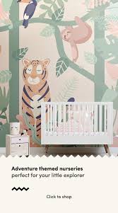 The background is a light beige, and the animals featured are their respective colors. Kids Animals Jungle Friends Wallpaper Mural Hovia Uk Adventure Theme Nursery Nursery Wallpaper Nursery Themes