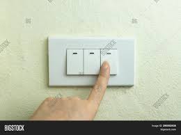 The light comes on or off. Wet Hand Turn On Image Photo Free Trial Bigstock