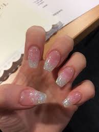 Ombré nails (just like ombré hair) are a type of manicure in which a color gradient is created. Glitter Ombre Acrylic Coffin Nails Glitter Ombre Acrylic Coffin Nails Accentn Acrylic Nails Coffin Short Acrylic Nails Coffin Glitter Simple Acrylic Nails