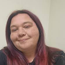 What breed is the large dog seen